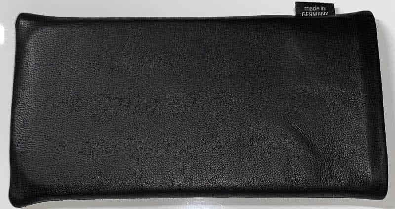 Photo #1: fitBAG leather sleeve with two types of leather: this side with nappa leather …
